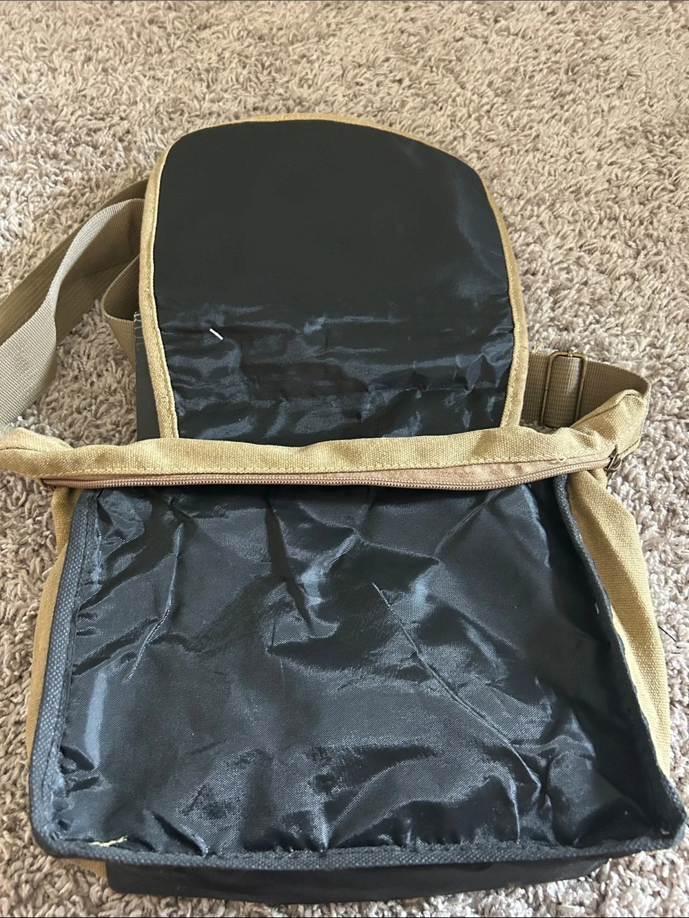Tan/khaki  Messenger crossbody Bag with Adjustable Strap. Waterproof liner